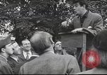 Image of Discussing politics in a Pub United Kingdom, 1953, second 43 stock footage video 65675065568