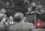 Image of Discussing politics in a Pub United Kingdom, 1953, second 44 stock footage video 65675065568