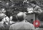 Image of Discussing politics in a Pub United Kingdom, 1953, second 49 stock footage video 65675065568