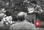 Image of Discussing politics in a Pub United Kingdom, 1953, second 50 stock footage video 65675065568
