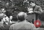 Image of Discussing politics in a Pub United Kingdom, 1953, second 51 stock footage video 65675065568