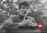 Image of Discussing politics in a Pub United Kingdom, 1953, second 58 stock footage video 65675065568
