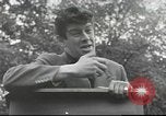 Image of Discussing politics in a Pub United Kingdom, 1953, second 59 stock footage video 65675065568