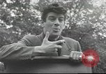 Image of Discussing politics in a Pub United Kingdom, 1953, second 60 stock footage video 65675065568