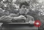 Image of Discussing politics in a Pub United Kingdom, 1953, second 61 stock footage video 65675065568