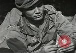 Image of Japanese-American soldiers in World War II France, 1944, second 32 stock footage video 65675065575