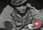 Image of Japanese-American soldiers in World War II France, 1944, second 33 stock footage video 65675065575