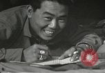 Image of Japanese-American soldiers in World War II France, 1944, second 52 stock footage video 65675065575