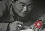 Image of Japanese-American soldiers in World War II France, 1944, second 58 stock footage video 65675065575