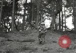 Immagine di Soldati Japanese-American si spostano in posizioni di combattimento Bruyeres Francia, 1944, secondo 17 filmato di repertorio 65675065592