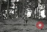 Immagine di Soldati Japanese-American si spostano in posizioni di combattimento Bruyeres Francia, 1944, secondo 18 filmato di repertorio 65675065592