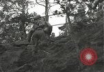 Immagine di Soldati Japanese-American si spostano in posizioni di combattimento Bruyeres Francia, 1944, secondo 52 filmato di repertorio 65675065592