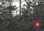 Immagine di Soldati Japanese-American si spostano in posizioni di combattimento Bruyeres Francia, 1944, secondo 54 filmato di repertorio 65675065592