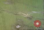 Image of gun camera footage US aircraft strafing Japanese installations World W Pacific Theater, 1945, second 13 stock footage video 65675065661