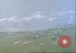 Image of gun camera footage US aircraft strafing Japanese installations World W Pacific Theater, 1945, second 19 stock footage video 65675065661