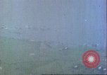 Image of gun camera footage US aircraft strafing Japanese installations World W Pacific Theater, 1945, second 30 stock footage video 65675065661
