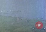 Image of gun camera footage US aircraft strafing Japanese installations World W Pacific Theater, 1945, second 31 stock footage video 65675065661