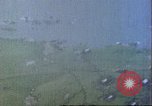Image of gun camera footage US aircraft strafing Japanese installations World W Pacific Theater, 1945, second 32 stock footage video 65675065661