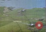 Image of gun camera footage US aircraft strafing Japanese installations World W Pacific Theater, 1945, second 36 stock footage video 65675065661