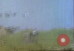 Image of gun camera footage US aircraft strafing Japanese installations World W Pacific Theater, 1945, second 37 stock footage video 65675065661