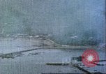 Image of gun camera footage US aircraft strafing Japanese installations World W Pacific Theater, 1945, second 44 stock footage video 65675065661