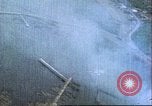 Image of gun camera footage US aircraft strafing Japanese installations World W Pacific Theater, 1945, second 54 stock footage video 65675065661