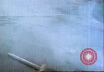 Image of gun camera footage US aircraft strafing Japanese installations World W Pacific Theater, 1945, second 57 stock footage video 65675065661
