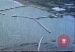 Image of gun camera footage US aircraft strafing Japanese installations World W Pacific Theater, 1945, second 62 stock footage video 65675065661