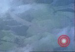 Image of strafing Japanese airfields gun camera footage Pacific Theater, 1945, second 3 stock footage video 65675065663