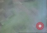 Image of strafing Japanese airfields gun camera footage Pacific Theater, 1945, second 9 stock footage video 65675065663