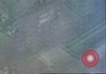 Image of strafing Japanese airfields gun camera footage Pacific Theater, 1945, second 10 stock footage video 65675065663