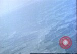 Image of strafing Japanese airfields gun camera footage Pacific Theater, 1945, second 12 stock footage video 65675065663