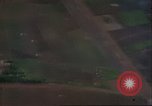 Image of strafing Japanese airfields gun camera footage Pacific Theater, 1945, second 14 stock footage video 65675065663