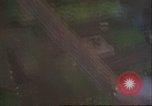 Image of strafing Japanese airfields gun camera footage Pacific Theater, 1945, second 15 stock footage video 65675065663