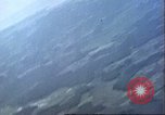 Image of strafing Japanese airfields gun camera footage Pacific Theater, 1945, second 18 stock footage video 65675065663