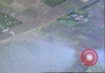 Image of strafing Japanese airfields gun camera footage Pacific Theater, 1945, second 20 stock footage video 65675065663