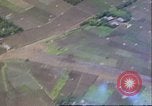 Image of strafing Japanese airfields gun camera footage Pacific Theater, 1945, second 21 stock footage video 65675065663