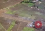Image of strafing Japanese airfields gun camera footage Pacific Theater, 1945, second 23 stock footage video 65675065663
