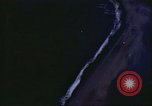 Image of strafing Japanese airfields gun camera footage Pacific Theater, 1945, second 26 stock footage video 65675065663