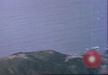 Standbild strafing japanische Installationen Pacific Theater, 1944, aus Sekunde 28 historischem Filmmaterial Videoclip 65675065665