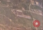 Image of strafing Japanese installations Pacific Theater, 1944, second 5 stock footage video 65675065666
