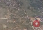 Image of strafing Japanese installations Pacific Theater, 1944, second 7 stock footage video 65675065666