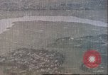 Image of strafing Japanese installations Pacific Theater, 1944, second 8 stock footage video 65675065666