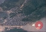 Image of strafing Japanese installations Pacific Theater, 1944, second 13 stock footage video 65675065666