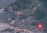 Image of strafing Japanese installations Pacific Theater, 1944, second 14 stock footage video 65675065666