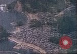 Image of strafing Japanese installations Pacific Theater, 1944, second 15 stock footage video 65675065666