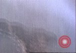 Image of strafing Japanese installations Pacific Theater, 1944, second 16 stock footage video 65675065666