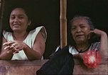 Image of native civilians Pacific Theater, 1944, second 22 stock footage video 65675065672