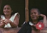 Image of native civilians Pacific Theater, 1944, second 23 stock footage video 65675065672