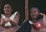 Image of native civilians Pacific Theater, 1944, second 24 stock footage video 65675065672